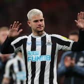 Newcastle United midfielder Bruno Guimaraes gestures to the fans after the final whistle.