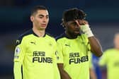 Miguel Almiron and Allan Saint-Maximin of Newcastle look on during the Premier League match between Leicester City and Newcastle United at The King Power Stadium on May 07, 2021 in Leicester, England.