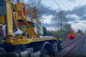 A still from a video shared by the Tyne and Wear Metro as its engineers repaired overhead lines brought down by severe weather.