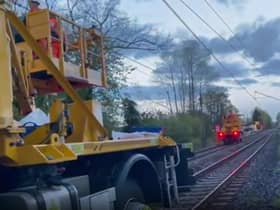 A still from a video shared by the Tyne and Wear Metro as its engineers repaired overhead lines brought down by severe weather.