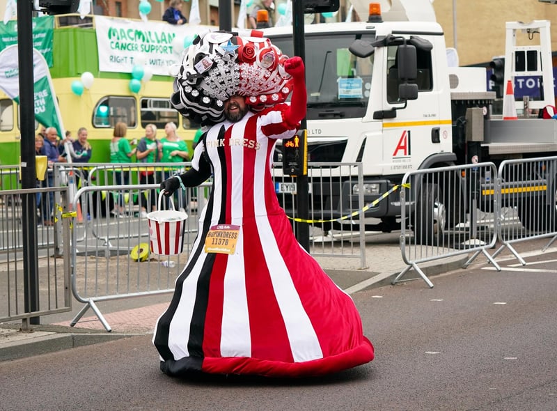 Colin Burgin-Plews also known as Big Pink Dress, regularly takes part in the Great North Run wearing huge handmade dresses, and raises money for charity.