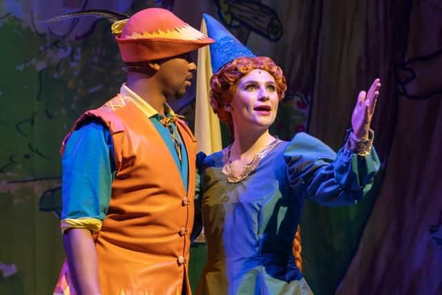 Robin Hood (Marcquelle Ward) and Maid Marian (Lucy Elizabeth Davis) shine on stage in the Customs House panto.