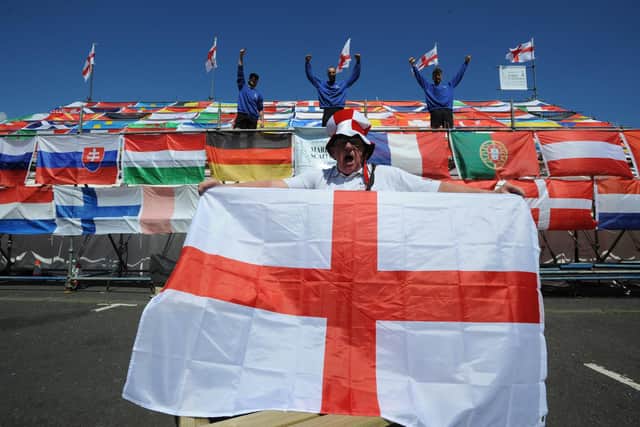 Come on England! Norman Scott of Dougie's Tavern has prepared for the Euros with help from JJ Mullen, Tom Mullen and Chris White of Marine Scaffolding. JPI image.