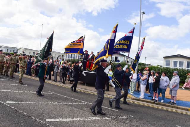 Standard bearers from numerous associations take part in the Armed Forces Day parade at South Shields on Sunday.