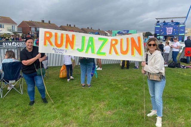 Rachael Ransbury, left, supporting her daughter Jasmine Trinder alongside Lauren Ransbury. What a great banner!