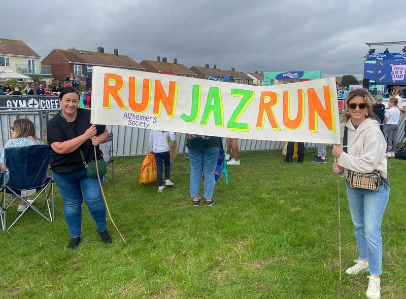 Rachael Ransbury, left, supporting her daughter Jasmine Trinder alongside Lauren Ransbury. What a great banner!