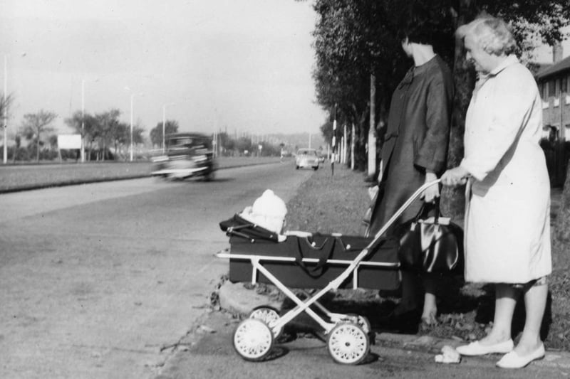 Waiting to cross King George Road in October 1965.