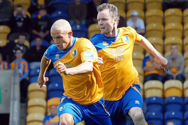 Joe Kendrick, right, playing for Mansfield Town later in his career.