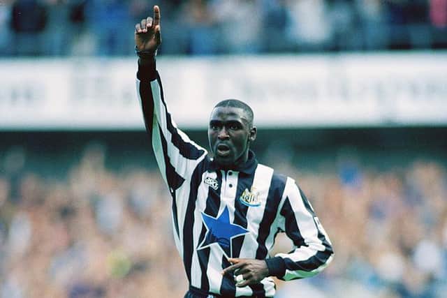 Newcastle forward Andy Cole celebrates after scoring in the FA Premiership match between Newcastle United and Southampton at St James' Park on September 27, 1994, in Newcastle, England.  (Photo by Clive Brunskill/Allsport UK/Getty Images)