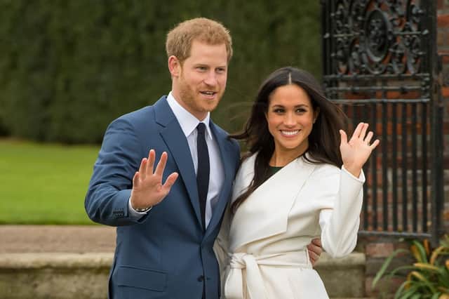 Prince Harry and Meghan Markle in the Sunken Garden at Kensington Palace, London, after the announcement of their engagement. Could their differences with other royals be settled with a pillow fight on a greased up log over a vat of sludge? Only time will tell.