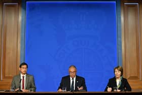 (Left to right) Professor Wei Shen Lim, chair of the Joint Committee on Vaccination and Immunisation (JCVI), Deputy Chief Medical Officer for England Professor Jonathan Van Tam and Dr June Raine, Chief Executive of the Medicines and Healthcare products Regulatory Agency (MHRA), during a media briefing in Downing Street, London, on coronavirus (Covid-19). Picture date: Tuesday September 14, 2021.