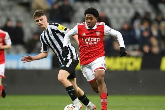 Scott Bailey (left) scored a late consolation for Newcastle United (Photo by David Price/Arsenal FC via Getty Images)