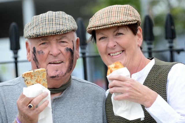 George Cook and Dee Clayton tuck in to the food.