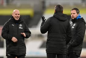 Newcastle United coaches Steve Agnew, Steve Harper and Stephen Clemence share a joke on the pitch in January.