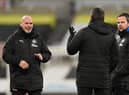 Newcastle United coaches Steve Agnew, Steve Harper and Stephen Clemence share a joke on the pitch in January.