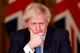 LONDON, ENGLAND - JANUARY 07: British Prime Minister, Boris Johnson speaks during a virtual press conference at No.10 Downing Street on January 7, 2021 in London, England. (Photo by Tolga Akmen - WPA Pool/Getty Images)