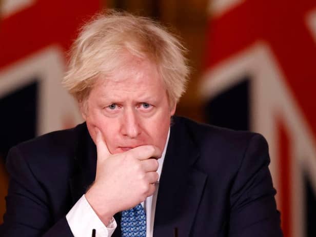 LONDON, ENGLAND - JANUARY 07: British Prime Minister, Boris Johnson speaks during a virtual press conference at No.10 Downing Street on January 7, 2021 in London, England. (Photo by Tolga Akmen - WPA Pool/Getty Images)