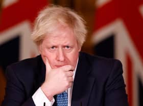 LONDON, ENGLAND - JANUARY 07: British Prime Minister, Boris Johnson speaks during a virtual press conference at No.10 Downing Street on January 7, 2021 in London, England. (Photo by Tolga Akmen - WPA Pool/Getty Images)