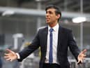Rishi Sunak talks to local business leaders during a visit to a Coca-Cola factory in Lisburn, Northern Ireland yesterday (Picture: Liam McBurney/WPA pool/Getty Images)