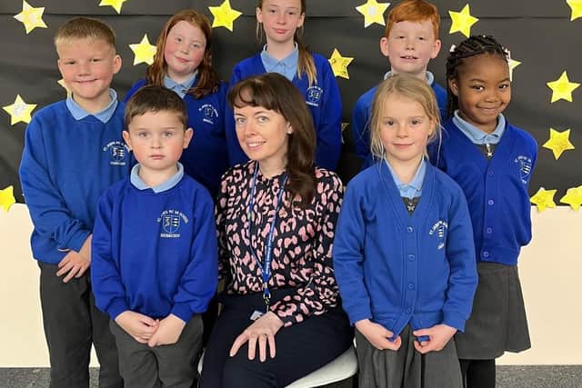 Headteacher Francesca Heslop with pupils at St James' Catholic Primary School, Hebburn.
