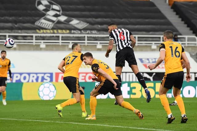 Newcastle United captain Jamaal Lascelles scoring at St James's Park against Wolves last season (Photo by Stu Forster/Getty Images)