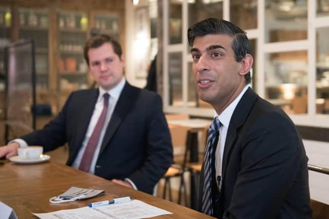 Chancellor of the Exchequer Rishi Sunak, right, with Housing Secretary Robert Jenrick, prior to announcing a new support package for businesses affected by Tier 2 restrictions (Stefan Rousseau/PA).