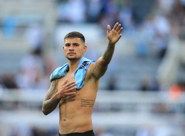 <p>Newcastle United's Brazilian midfielder Bruno Guimaraes waves to fans at the end of the English Premier League football match between Newcastle United and Manchester City at St James' Park in Newcastle-upon-Tyne, north east England, on August 21, 2022.  (Photo by Lindsey Parnaby / AFP)</p>