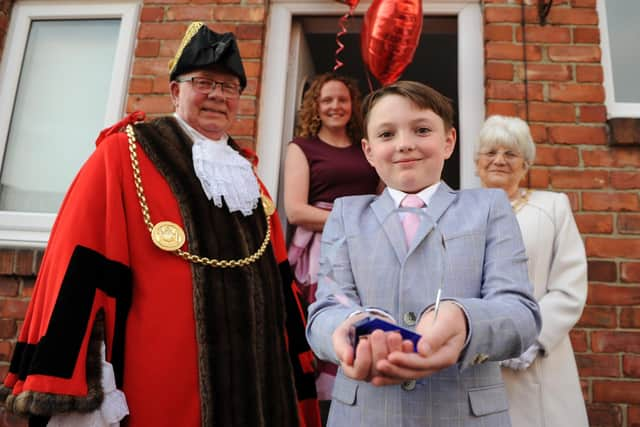 #LoveSouthTyneside winner 9-year-old Oliver Nicholson receives his award from the Mayor Cllr Norman Dick and Mayoress Mrs Jean Williamson.