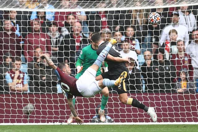 Emi Buendia of Aston Villa scores their side's first goal from an overhead kick during the Premier League match between Aston Villa and Newcastle United at Villa Park on August 21, 2021 in Birmingham, England. (Photo by Ryan Pierse/Getty Images)