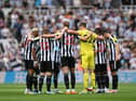 The Newcastle United team huddle before the Premier League match between Newcastle United and Nottingham Forest at St. James Park on August 06, 2022 in Newcastle upon Tyne, England. (Photo by Stu Forster/Getty Images)