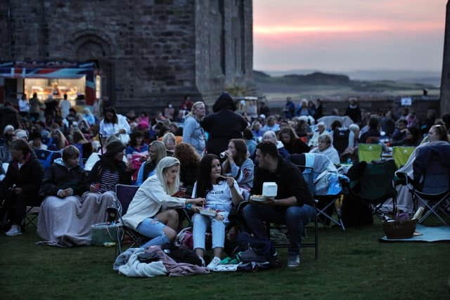 Open air film night at Bamburgh Castle. Photograph: Stuart Boulton. 