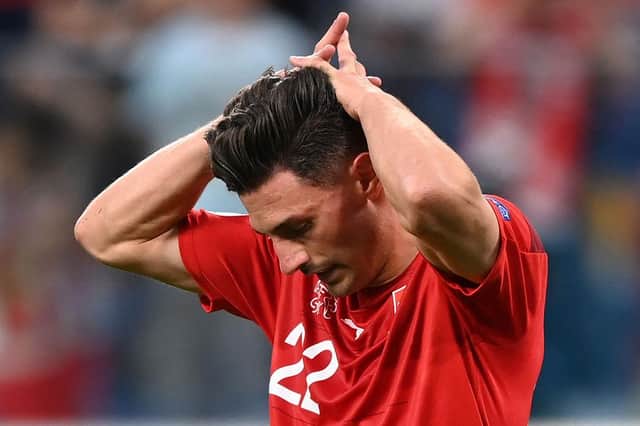 Fabian Schar reacts to his saved penalty.