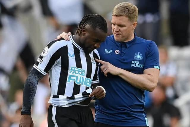 Allan Saint-Maximin of Newcastle United talks with Eddie Howe, Manager of Newcastle United, after the final whistle of the Premier League match between Newcastle United and Manchester City at St. James Park on August 21, 2022 in Newcastle upon Tyne, England. (Photo by Stu Forster/Getty Images)