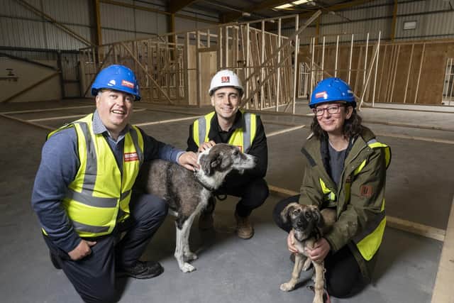 From L to R Iain Kennair, Project Manager at Bridge Referrals and Pebble, Dan Miller, Site Manager, Brims Construction and Sarah Harrison, Director and Veterinary Ophthalmologist and Ernie.