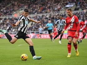 Newcastle player Lewis Miley shoots at goal despite the attentions of Rayo defender and former Newcastle defender Florian Lejeune during the friendly match between Newcastle United and Rayo Vallecano  at St James' Park on December 17, 2022 in Newcastle upon Tyne, England. (Photo by Stu Forster/Getty Images)