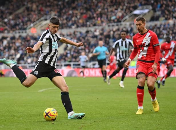 Newcastle player Lewis Miley shoots at goal despite the attentions of Rayo defender and former Newcastle defender Florian Lejeune during the friendly match between Newcastle United and Rayo Vallecano  at St James' Park on December 17, 2022 in Newcastle upon Tyne, England. (Photo by Stu Forster/Getty Images)