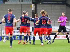 Sunderland celebrate Grant Leadbitter's opening goal at Burton Albion