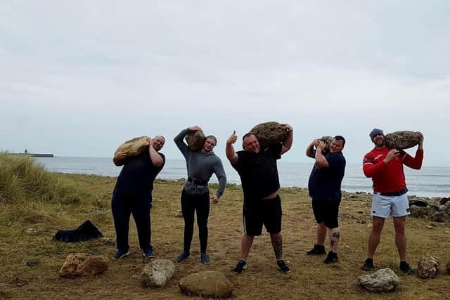 outh Shields Stone Lifters members Stuart Robertson, Bradley Wall, Michael Scott, Anthony Higgins pictured during one of their beach training sessions