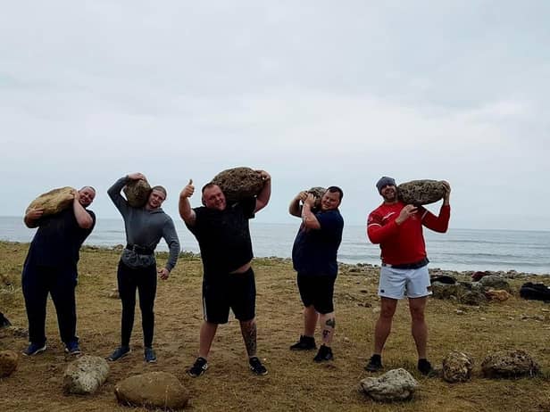 outh Shields Stone Lifters members Stuart Robertson, Bradley Wall, Michael Scott, Anthony Higgins pictured during one of their beach training sessions