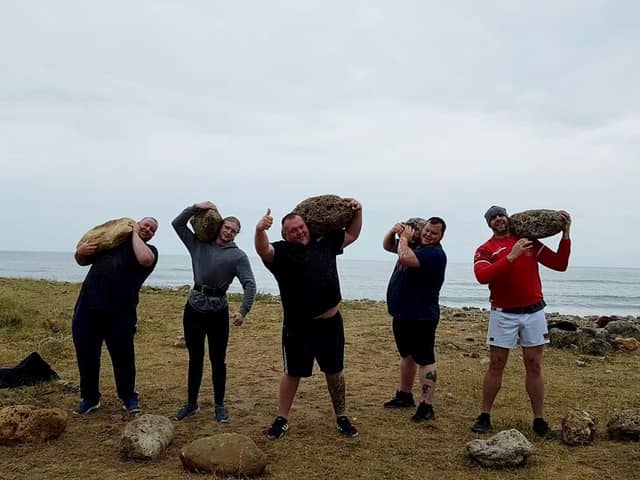 outh Shields Stone Lifters members Stuart Robertson, Bradley Wall, Michael Scott, Anthony Higgins pictured during one of their beach training sessions