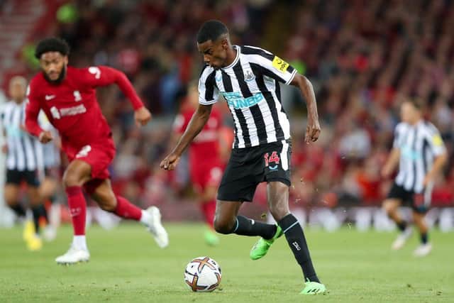 LIVERPOOL, ENGLAND - AUGUST 31: Alexander Isak of Newcastle United runs with the ball during the Premier League match between Liverpool FC and Newcastle United at Anfield on August 31, 2022 in Liverpool, England. (Photo by Alex Livesey/Getty Images)
