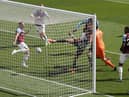 Newcastle United's Brazilian striker Joelinton (C) shoots and scores a goal during the English Premier League football match between Newcastle United and West Ham United at St James' Park in Newcastle-upon-Tyne, north east England on April 17, 2021.