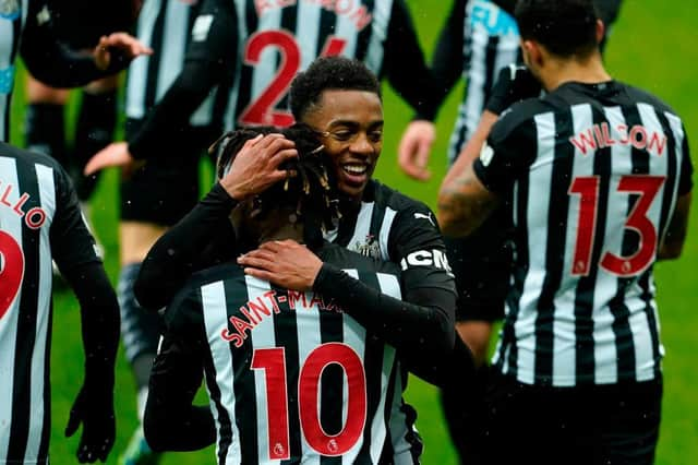 Joe Willock's celebrates his goal against Southampton with Allan Saint-Maximin.