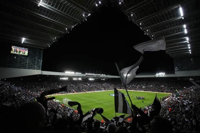 Fans of Newcastle United show their support during the Carabao Cup Quarter Final match between Newcastle United and Leicester City at St James' Park on January 10, 2023 in Newcastle upon Tyne, England. (Photo by George Wood/Getty Images)