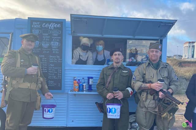 The marchers received free coffee from Bessy's Sweet Bakes van