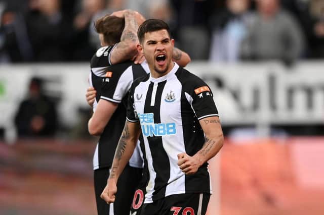 Bruno Guimaraes of Newcastle United celebrates after their side's first goal scored by Chris Wood of Newcastle United (not pictured) during the Premier League match between Newcastle United and Wolverhampton Wanderers at St. James Park on April 08, 2022 in Newcastle upon Tyne, England. (Photo by Stu Forster/Getty Images)