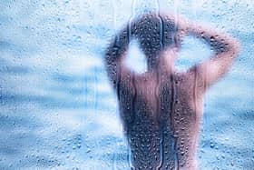 As soon as the alarm goes off, jump up turn it off, and get in the shower. Quickly shower and clean your teeth. This will wake you up straight away.