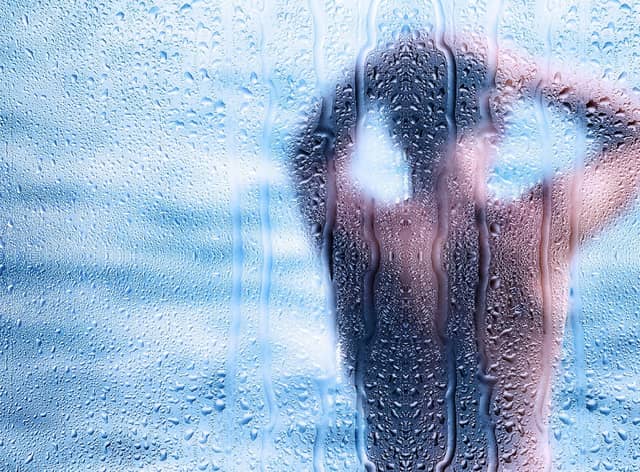 As soon as the alarm goes off, jump up turn it off, and get in the shower. Quickly shower and clean your teeth. This will wake you up straight away.