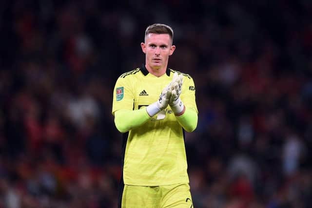 Manchester United's Dean Henderson has been heavily-linked with a move to Newcastle this summer (Photo by OLI SCARFF/AFP via Getty Images)