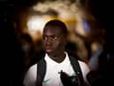 Garang Kuol of the Socceroos talks to he media on arrival at Sydney International Airport on December 05, 2022 in Sydney, Australia. (Photo by Mark Evans/Getty Images)